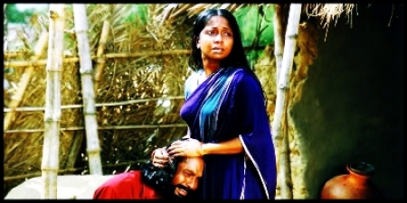 Rokeya prachi and mahmuduzzaman babu in the film Shopnodanay